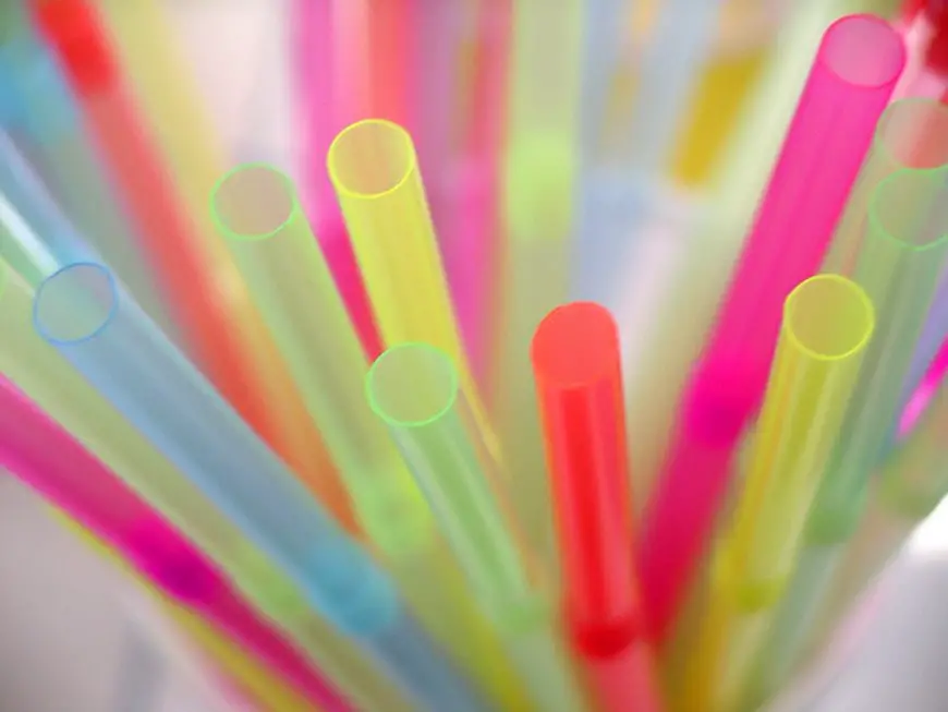 Closeup of colorful drinking straws with shallow depth of field.
