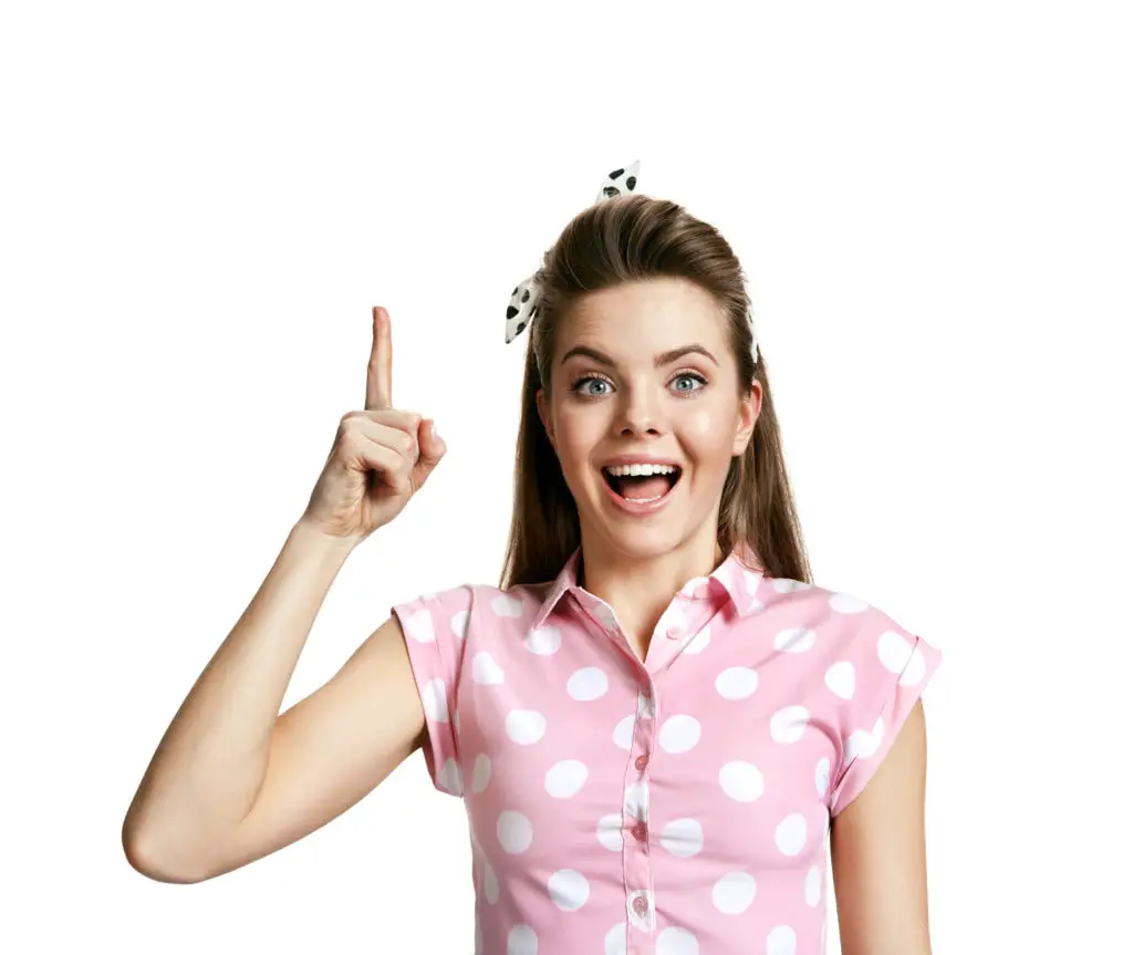 Young woman having good idea, pointing finger up and looking at camera. Refresh one's memory / photo of young cheerful brunette woman over white background, positive emotions